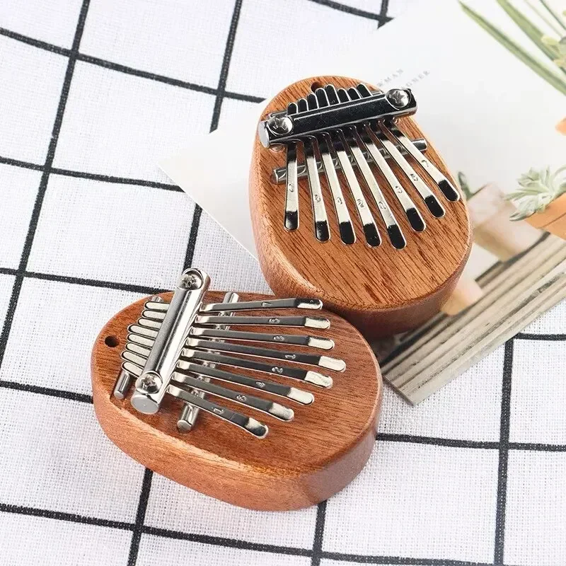 بيانو إصبع خشبي صغير بـ 8 نغما - مراجعة Musical Instrument Kalimba وسعره